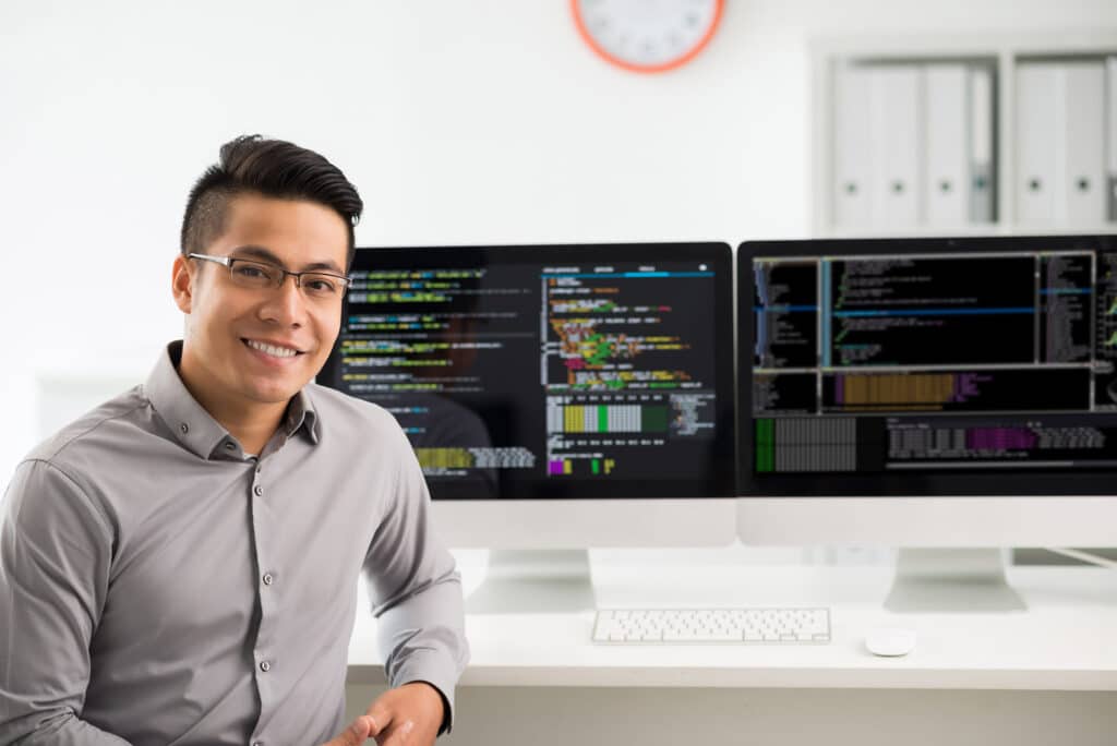 Portrait of smiling software engineer